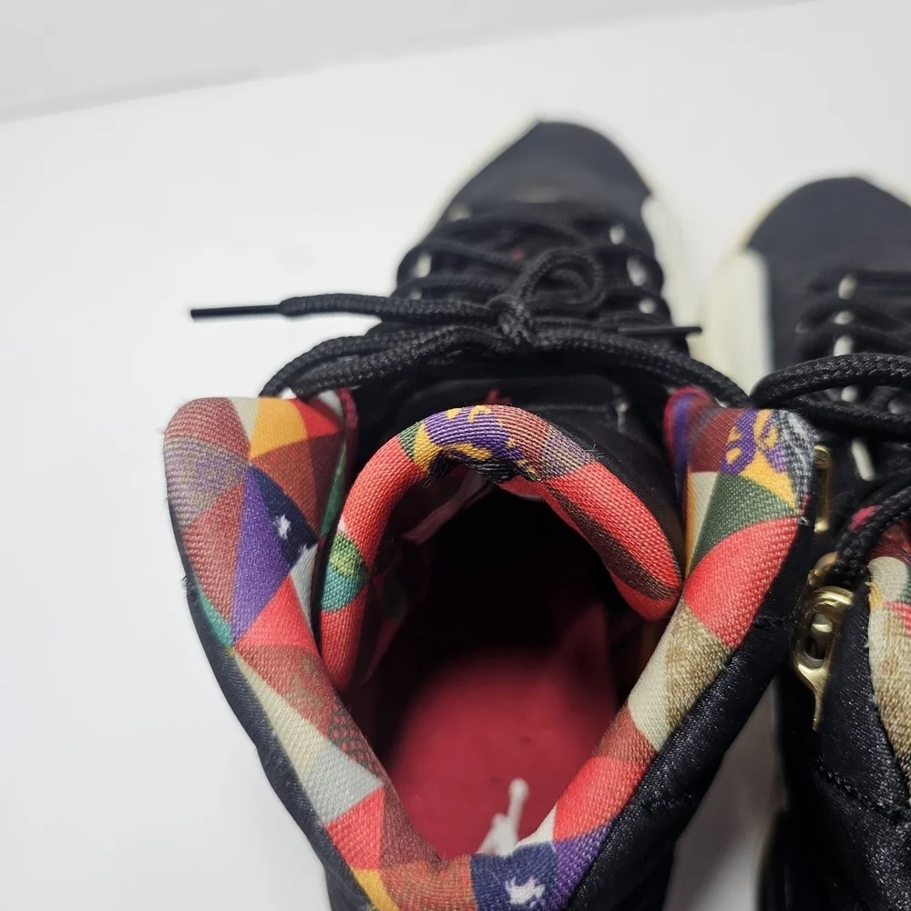 Jordan Black and White Sneakers with Gold Accents
